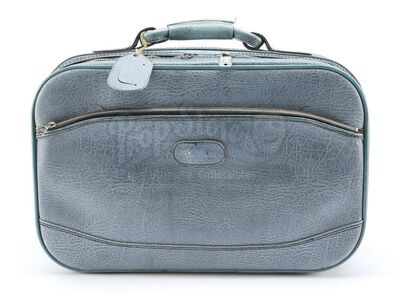 Lot # 135: THE HAUNTING OF BLY MANOR - Dani Clayton's Suitcase and Toiletry Bags