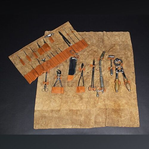 R.M. Renfield (Nonso Anozie) Torture Implements in Leather Covers