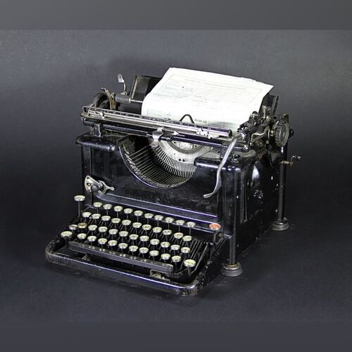 Inquisitor Vintage Remington Typewriter with Document