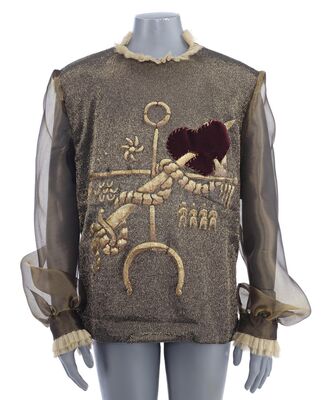 Lot # 39: ZOOLANDER 2 - Derek Zoolander Jr.'s Gold Shirt