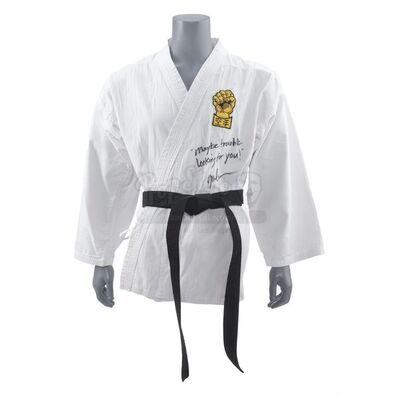 Lot # 157: THE KARATE KID PART II (1986) - Chozen Toguchi's (Yuji Okumoto) Signed Karate Gi