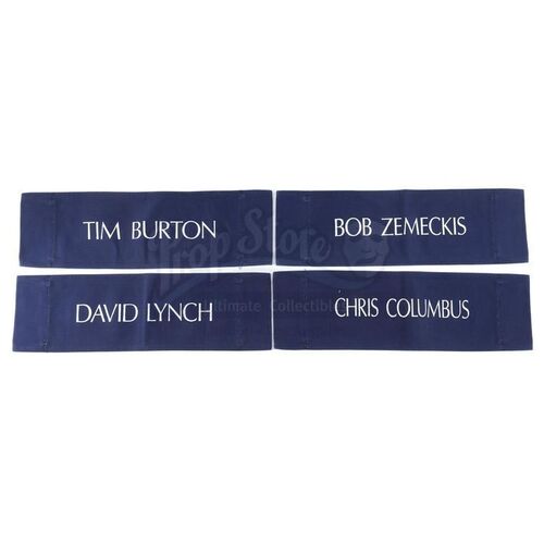 Lot # 457: ADDAMS FAMILY (1991), THE - Tim Burton, Chris Columbus, David Lynch, and Bob Zemeckis Joke Chair Backs