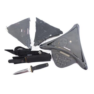 Lot # 628: DOGMA (1999) - Loki's (Matt Damon) Knives, SFX Speakerphone, and Leg Sheath