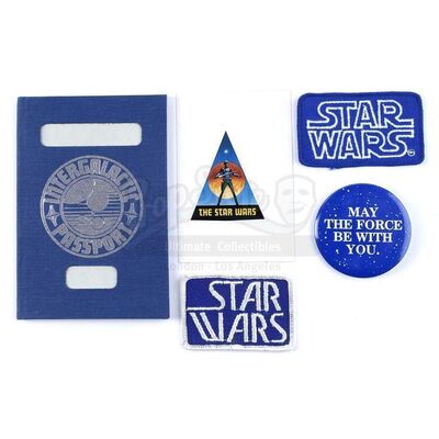 Lot # 1164: STAR WARS - EP IV - A NEW HOPE (1977) - Intergalactic Passport, Crew Patches, Button and Sticker