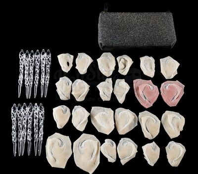 Lot # 213: The Gifted - Blink's Portal Daggers, Ear Appliances, and Makeup Accessories