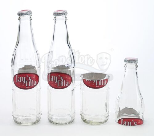 Lot # 283: The Gifted - Lauren Strucker's Sliced Jay's Cola Bottle with Two Whole Bottles