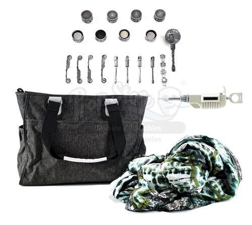 Lot # 284: The Gifted - Dawn's Rattle with Diaper Bag and Light-Up Temperature Device