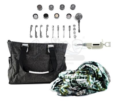 Lot # 284: The Gifted - Dawn's Rattle with Diaper Bag and Light-Up Temperature Device