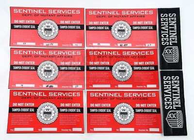 Lot # 311: The Gifted - Sentinel Services Patches and Warning Stickers