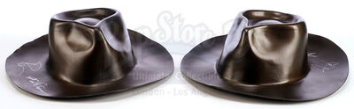 Lot # 81: Various Episodes: Two Vacuum Formed Replicas of Adam's Daily Hat
