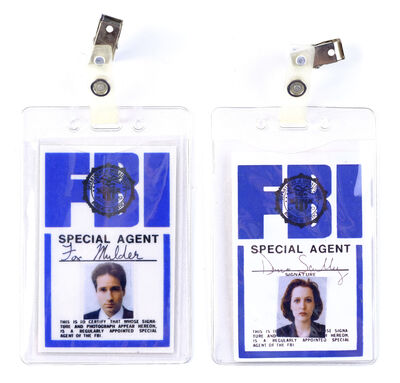 Lot #404 - THE X-FILES (T.V. SERIES, 1993 - 2018) - Dana Scully (Gillian Anderson) and Fox Mulder's (David Duchovny) FBI ID Badges