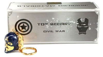 Lot #488 - CAPTAIN AMERICA: CIVIL WAR (2016) - Robert Downey, Jr.-autographed Crew Gift Keychain