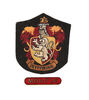 Lot #166 - HARRY POTTER AND THE DEATHLY HALLOWS: PART 2 (2011) - Gryffindor House Patch and "Monitor" Badge