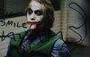 Lot #469 - THE DARK KNIGHT (2008) - Heath Ledger-autographed Joker Interrogation Photo - 2