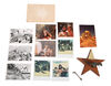 Lot #490 - CAVEMAN (1981) - Ringo Starr and Barbara Bach Dinosaur and Bone-pendant Crew Gift, 10 On-set Photographs and Autographed Note