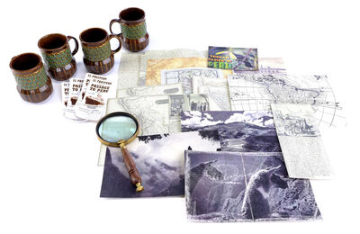 Lot # 31: Netflix's A Series of Unfortunate Events (TV Series) - Uncle Monty's Coco Mugs with Peru Pamphlets, Magnifying Glass, and Maps