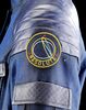 Lot # 37: Lost In Space (2018-2021) - Officer Hasting (Douglas Hodge) Resolute Uniform Jacket and Crew Moderator Lab Coat with Mission 24 Patch - 17