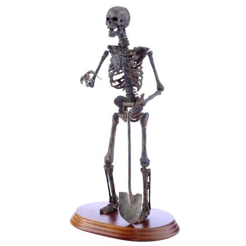 Lot # 260: Nightmare On Elm Street 3: Dream Warriors (1987) - Doug Beswick Collection: Freddy Krueger's (Robert Englund) Stop-Motion Skeleton and Shovel Display