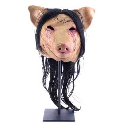 Lot # 308: Saw: The Final Chapter (2010) - Cary Elwes-Autographed Pig Mask