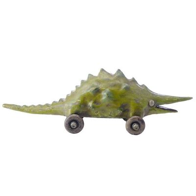 Lot # 493: The Addams Family (1991) - Wednesday Addams' (Christina Ricci) Photo-Matched Dinosaur Toy