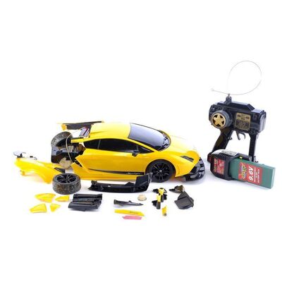 Lot # 593: Breaking Bad (T.V. Series, 2008 - 2013) - Broken Yellow Radio-Controlled Toy Car