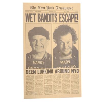 Lot # 829: Home Alone 2: Lost In New York (1992) - "Wet Bandits Escape!" Newspaper Cover