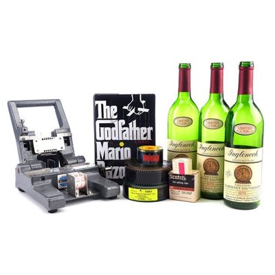 Lot # 1034: The Offer (T.V. Series, 2022) - Francis Ford Coppola's Film Splicer with Wine Bottles and Godfather Novel