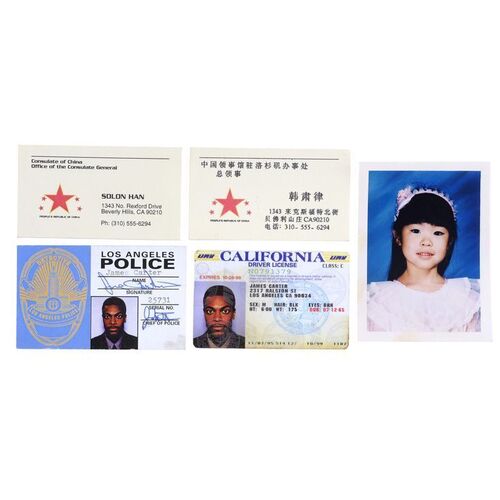Lot # 1105: Rush Hour (1998) - James Carter's (Chris Tucker) Police I.D. and Driver's License with Soo Yung's (Julia Hsu) Photo, and Chinese Consulate Cards