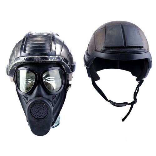 Lot # 1127: Soldier (1998) - Soldier Helmet with Villain Soldier Helmet and Gas Mask