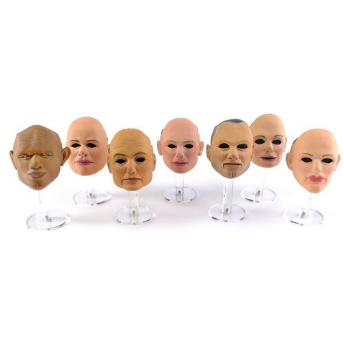 Lot # 1345: Team America: World Police (2004) - Set of Seven Puppet Faces