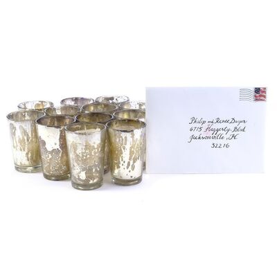 Lot # 1407: The Twilight Saga: Breaking Dawn Part 1 (2011) - Phil and Renee Dwyer's Cullen Wedding Invitation with 12 Wedding Candles