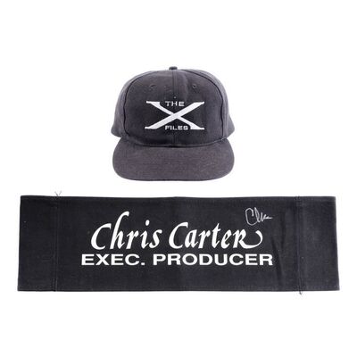 Lot # 1442: The X-Files (T.V. Series, 1993 - 2002, 2016 - 2018) - Chris Carter-Autographed Chairback with Crew Hat