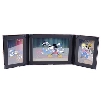 Lot # 1813: Magician Mickey (1937) - J.W. Rinzler Collection: Leather-Bound Magician Mickey, Donald Duck, and Goofy Sericel Triptych #119/495
