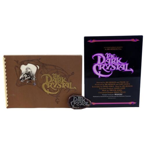 Lot # 1868: The Dark Crystal (1982) - Press Book, Program and Belt Buckle