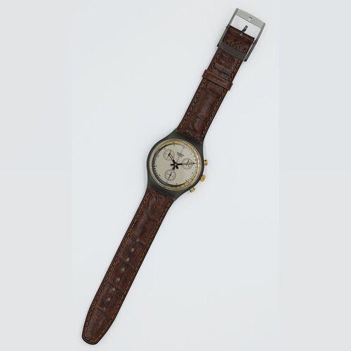 Lot #88 - SWATCH - Goldfinger SCM100