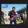 Lot #20 - BACK TO THE FUTURE PART II (1989) - Michael J. Fox Autographed Full-colour Photograph