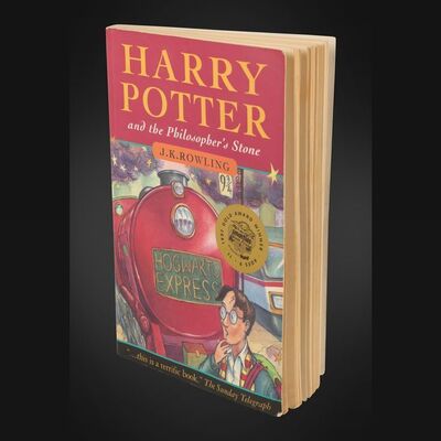 Lot #125 - HARRY POTTER AND THE PHILOSOPHER'S STONE (2001) - J.K. Rowling Autographed British Paperback Edition, 1997