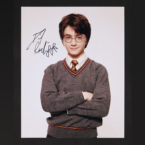 Lot #126 - HARRY POTTER AND THE CHAMBER OF SECRETS (2002) - Daniel Radcliffe Autographed Colour Photograph