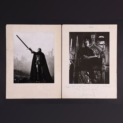 Lot #243 - CAMELOT (1967) - Pair of Black-and-white Character Stills With One Signed and Annotated by Richard Harris