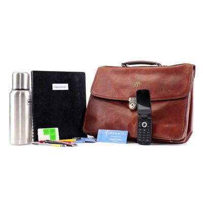 Lot # 9: Jimmy McGill (as played by Bob Odenkirk) Briefcase, Accessories and Water Bottle