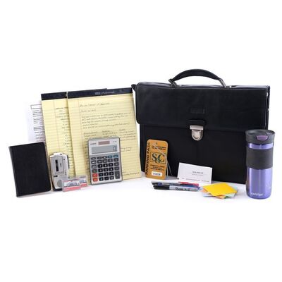 Lot # 28: Kim Wexler (as played by Rhea Seehorn) Briefcase, Accessories, and Coffee Mug