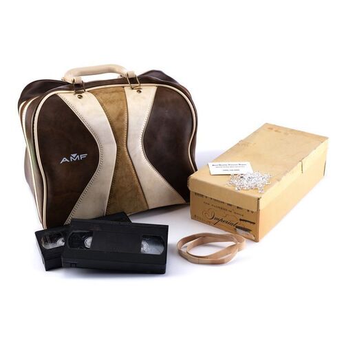 Lot # 106: Saul Goodman (as played by Bob Odenkirk) Bowling Ball Money Bag and Box of Mementos