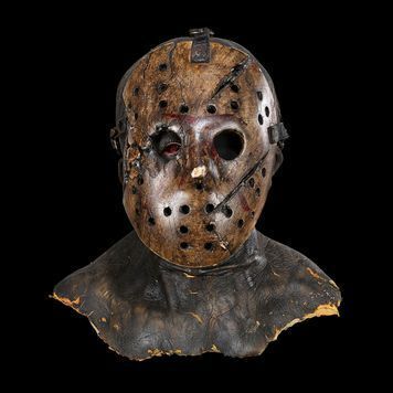 Lot # 156 : FREDDY VS. JASON (2003) - Mario Kirner Collection: Jason Voorhees' (Ken Kirzinger) Screen-matched Battle-damaged Hockey Mask and Cowl