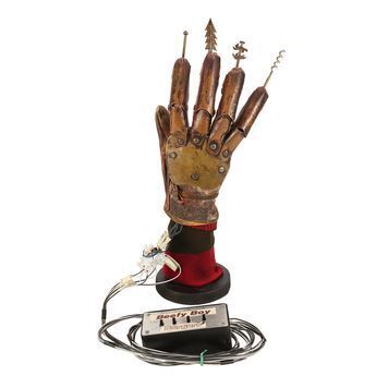 Lot # 288 : FREDDY'S NIGHTMARES (T.V. SERIES, 1988 - 1990) - Freddy Krueger's (Robert Englund) Screen-matched Mechanical Dentist Glove