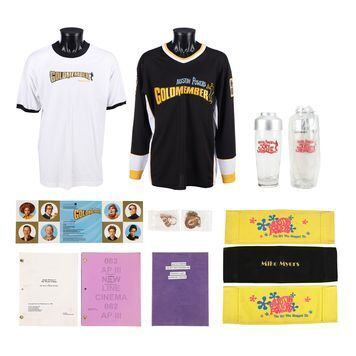 Lot # 694 : AUSTIN POWERS: THE SPY WHO SHAGGED ME (1999) AND AUSTIN POWERS IN GOLDMEMBER (2002) - Set of Scripts, Crew Gifts and Chair Backs