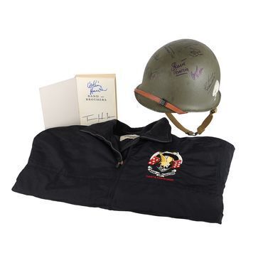 Lot # 708 : BAND OF BROTHERS (T.V. Series, 2001) - Cast-autographed Helmet, Tom Hanks-autographed Book and Crew Jacket