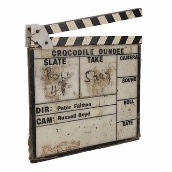 Lot # 823 : CROCODILE DUNDEE (1986) - Production-used Clapperboard