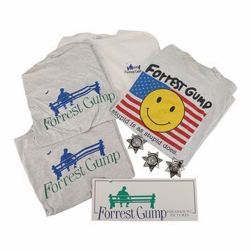 Lot # 914 : FORREST GUMP (1994) - Three Greenbow County Police Badges, Production Sign and Four Crew T-Shirts