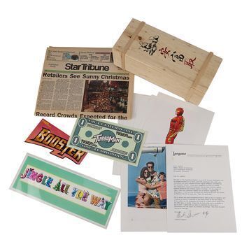 Lot # 1088 : JINGLE ALL THE WAY (1996) - Arnold Schwarzenegger Signed Letter, Karate Box, Gift Certificate, Newspaper and Costume Designs