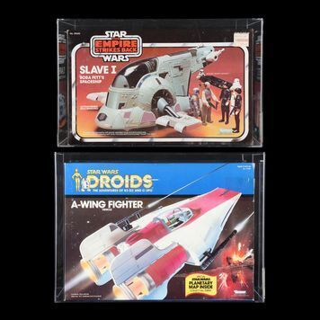 Lot # 1379 : STAR WARS: THE EMPIRE STRIKES BACK (1980) AND STAR WARS: DROIDS (1985) - AFA Graded Kenner Slave I and A-Wing Fighter